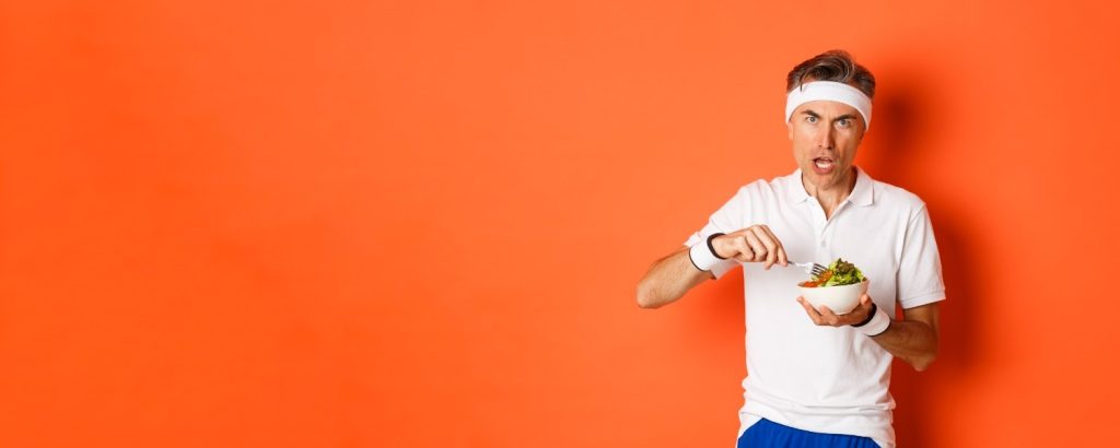 Healthy post-workout foods including chicken, eggs, oatmeal, Greek yogurt, fruit, and rice